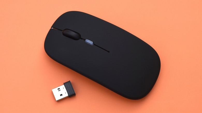 A wireless mouse with a 2.4G dongle