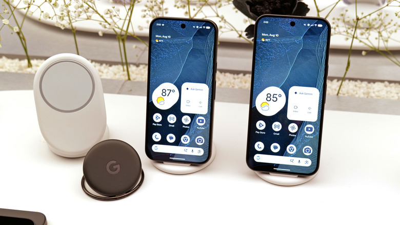 Google Pixel 11 Pro and Pro XL posed on magnetic PixelSnap ring stands.