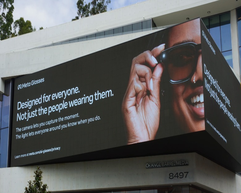 A billboard showing Meta Glasses and the LED light that explains how it works.